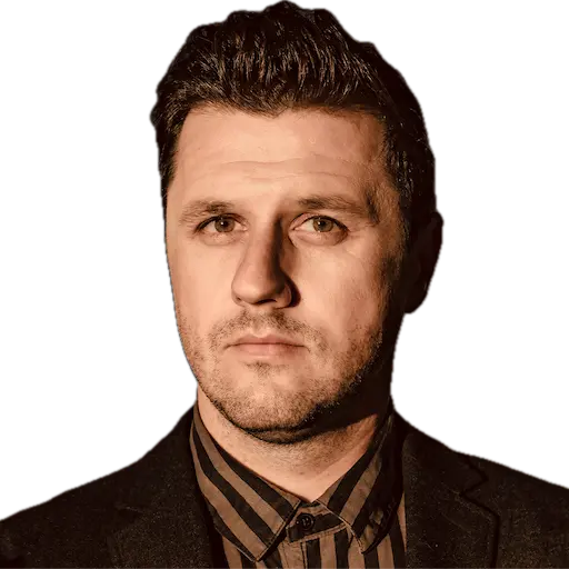 Professional headshot of Tudor Crețu, Senior Product Leader, in a business attire against a neutral background.